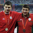 Белорусские призёры Олимпиады-2008 в метании молота Вадим Девятовский и Иван Тихон.